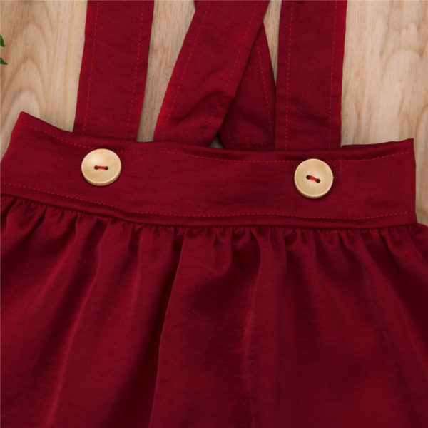Jolie jupe bordeaux avec bretelles avec boutons