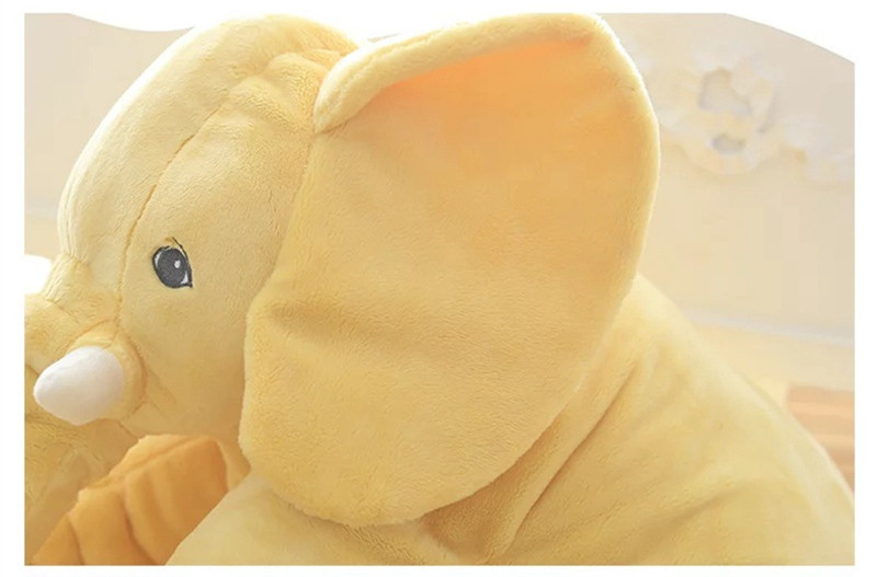 Peluche éléphant jaune - vue de profil