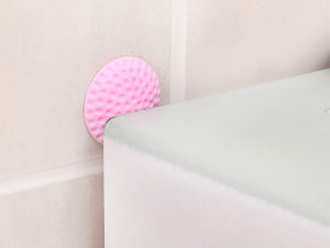 Amortisseur de meubles contre le mur