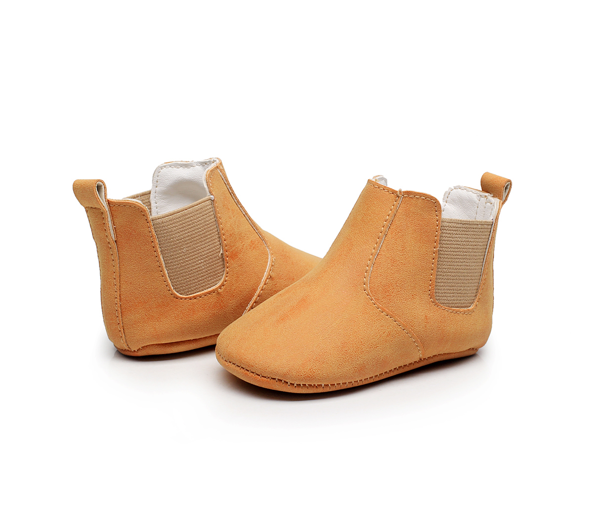 Mocassins en cuir couleur orange pour bébé