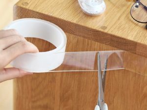 Rouleau de scotch magique double face pour coller des objets sur le bureau